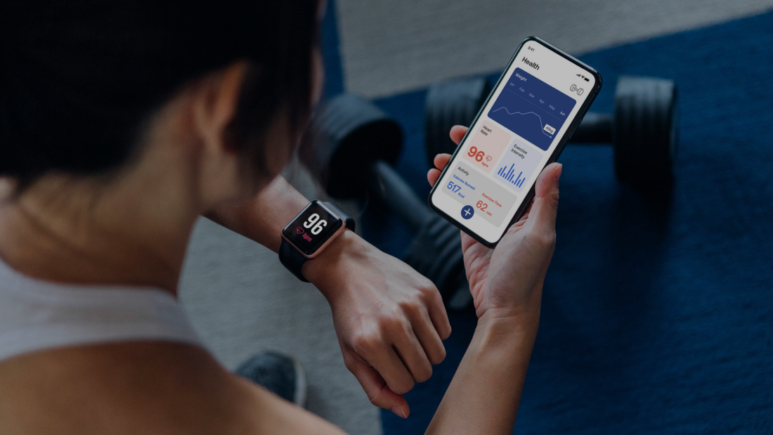 Smartphone workout app wearable tracker nearby